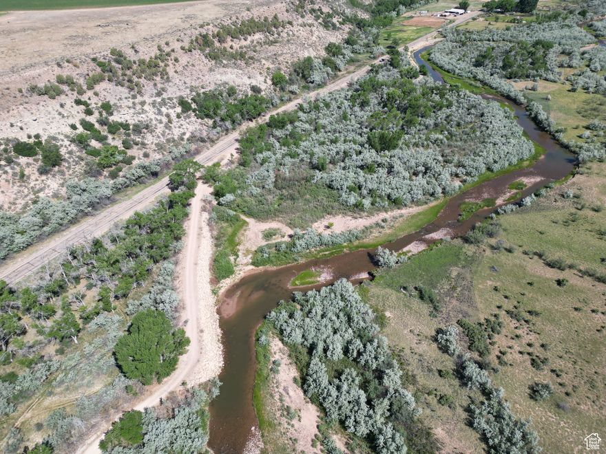 Amazing opportunity to own over 7 acres of land only steps from the Duchesne River.  Build your dream home or subdivide and develop.  This property boarders Duchesne City limits and has the possibility of being annexed into the city.  This land is located in a highly sought after area along River Rd.  Property is about .6 miles past the Duchesne Elementary School on River Rd. There is an additional 11.6 acre lot to the south of this property also for sale.  Owner would be willing to negotiate a deal if the properties are bought together.  (Parcel #00-0000-8767 )  Acreage figures are provided as a courtesy estimate only. Buyer is advised to obtain an independent measurement.