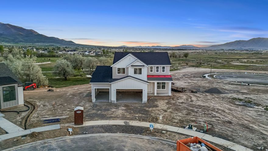 The Juniper by Revere Homes |. Where modern design meets everyday comfort in beautiful Davis Farms, one of Utah Valley's premier communities. Located in a highly sought after, family friendly neighborhood. This modern farmhouse offers luxury finishes and thoughtful design throughout. The home features a stunning kitchen including high end finishes, and a layout built for gathering and entertaining. Bright, open living spaces, statement windows with a stunning view of the Wasatch Mountain Range. Large picture windows and abundant natural light create a warm, inviting feel. Potential ADU in the basement with a covered walk out, enjoy access to the Grimes Pond Trail System. This is a beautiful location in a great area with panoramic views and great connectivity. The perfect combining of modern farmhouse style, luxury living, and a premier Davis Farms Salem, Utah Location! 3% in concessions available with the use of builders preferred lender.