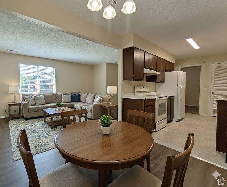 Affordable 2-bedroom condo in Roy, Utah, located minutes from Hill Air Force Base and offering easy access to I-15 for commuting. This move-in-ready unit features new carpet and fresh paint, central air conditioning, a private covered balcony, and a spacious walk-in closet. The single-level layout includes one full bathroom, free storage, and low-maintenance HOA living.  Ideal for first-time homebuyers, downsizers, or rental investors. Conveniently situated about 15 minutes from Weber State University and the Bonneville Shoreline Trail, this condo combines comfort, location, and value. Select photos include virtual staging to demonstrate layout and furniture options.