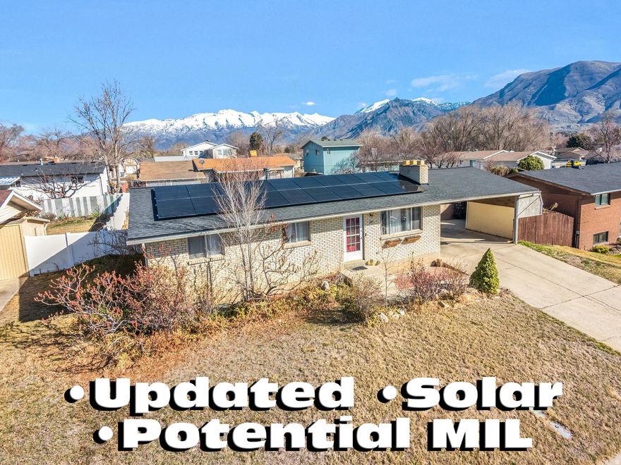 Charming Home with Modern Upgrades, Large Private yard and Beautiful Mountain Views! Step inside to a beautifully updated Main floor including Bedrooms, Flooring, Bath and stunning Kitchen with stainless  Appliances. Expansive, fully fenced yard with existing garden areas, fruit trees and vines. Includes a large shed for gardening tools and outdoor equipment. The Home is perfectly situated in a quiet neighborhood with fast freeway access. Highly energy efficient thanks to a new giant solar system. A perfect home to add A Mother-in-law apartment with private entrance due to easy basement utility access and easy to modify back entrance.