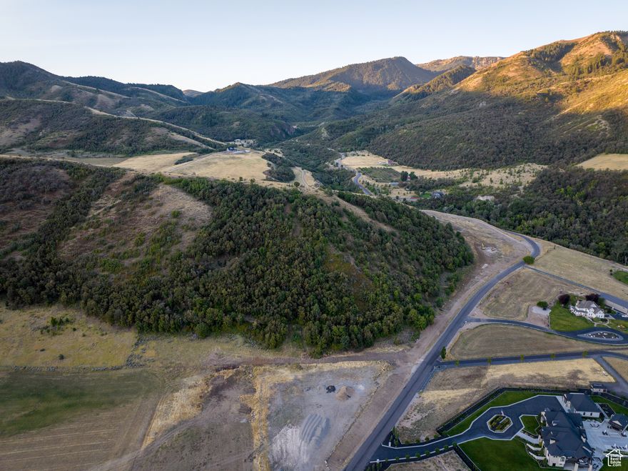 Introducing an exclusive opportunity in Mantua, Utah: 4 luxury land lots with expansive views and close proximity to recreational activities. Culinary water is available, and you can bring your own builder or choose from our trusted partners.  Purchase 1 or combine for additional land. Don't miss your chance to build your dream home in this limited community!