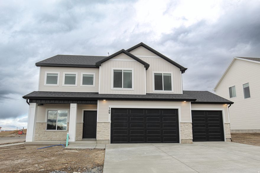 Seller offering a 4% ($23,000) incentive for a limited time!  Come check out this beautiful NEW home and awesome community!  Spacious 9ft ceilings on the main floor.  Tons of big windows for lots of natural light.  Gorgeous quartz countertops and quality soft close cabinets that go the ceiling.  Beautiful tile backsplash.  Open concept kitchen, dining, and great room area with a gas fireplace.  Upstairs you'll find all the bedrooms and a loft area.  You'll love the views from your primary suite.  Enjoy the soaker tub or the separate walk in shower and the big walk in closet.  Laundry room upstairs as it should be.  Third car garage for all the toys.  You are going to love your new Kartchner home and will be impressed by the quality and attention to detail!  Two year warranty!  Square footage figures are provided as a courtesy estimate only and were obtained from sales brochure.  Buyer is advised to obtain an independent measurement.