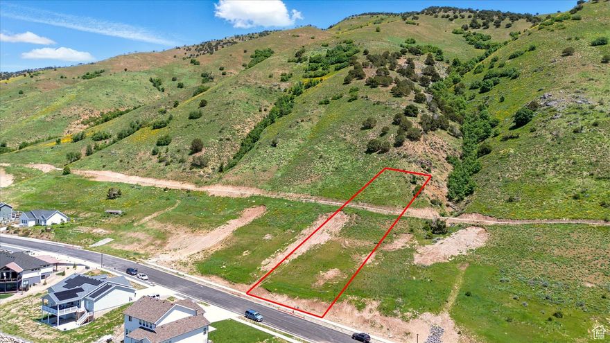 Build-ready and breathtaking-this premium east bench lot in Wildercrest offers more than stunning views and trail access; it offers a HEAD START. Nestled along the Bonneville Shoreline Trail with sweeping vistas of Cache Valley, this lot is fully primed. North Logan City mandates a detailed geotechnical and slope stability analysis before building. This is an intensive process that typically takes 4+ months and costs tens of thousands of dollars. This process has been COMPLETED, giving you peace of mind and saving you both time and money. Located on a quiet, sidewalk-lined street, with no HOA restrictions and bring-your-own-builder flexibility, this is a rare opportunity to break ground now without delay.
