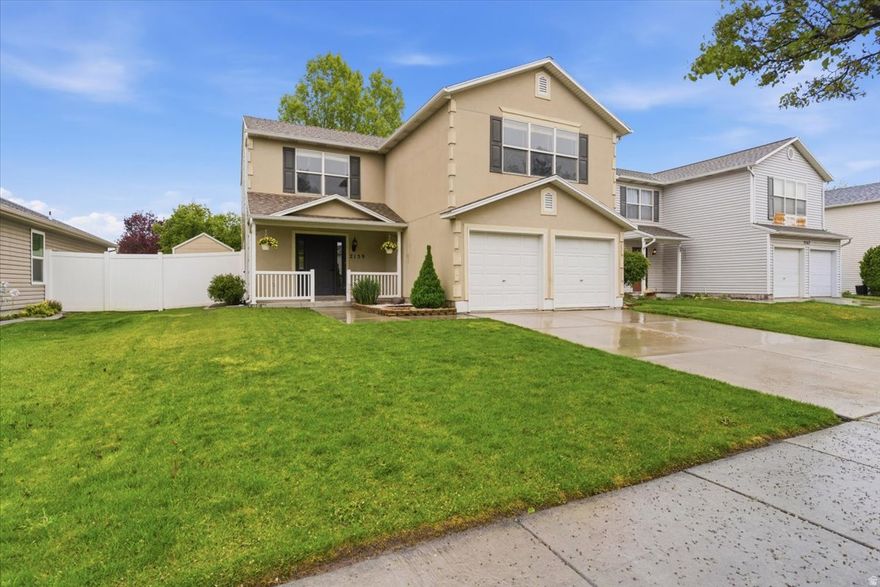 Beautifully updated home just moments from Utah Lake, where morning walks, sunset views, and weekend adventures are part of everyday life. Enjoy peace of mind with a new roof, siding, and vinyl fence all completed in 2024. Inside, you'll find fresh upgrades throughout including granite countertops, updated sinks and faucets, new carpet, and refreshed showers, all paired with a light-filled, functional layout. Every bedroom features a walk-in closet, and ceiling fans throughout add comfort year-round.  Step outside to your own private backyard retreat-no rear neighbors, a thriving raspberry bush, and the perfect space for quiet mornings or summer gatherings. Just 1.5 blocks from the lake, you'll love the easy access to trails, water, and open space while still being close to daily conveniences. With no HOA and a spacious 2-car garage, this home offers the freedom and lifestyle you've been looking for.