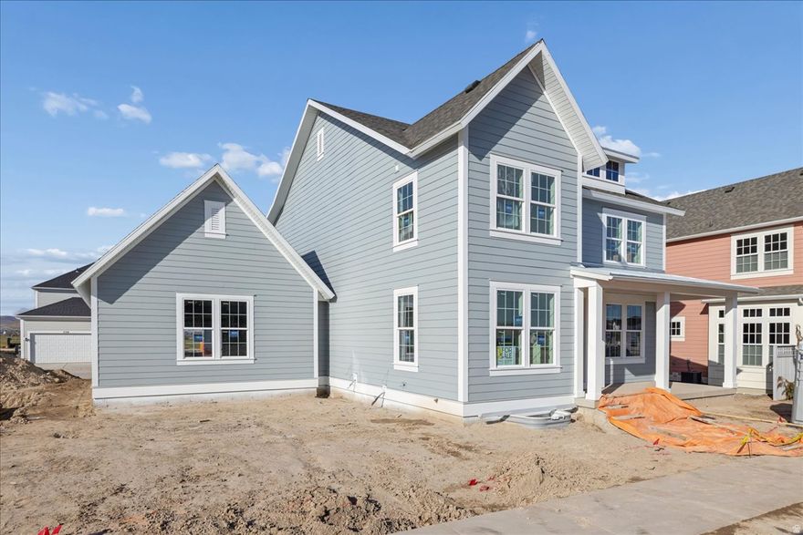 2.875%* first year interest rate available for a limited time!!   Currently under construction, come see us at our model at 964 Mathilda and we can give you a guided tour! Introducing the Ridgefield Farmhouse II at Beacon Pointe-where timeless design meets everyday functionality in one of Saratoga Springs' most desirable communities. This thoughtfully crafted home features a spacious open-concept layout that seamlessly connects the kitchen, great room, and dining area, making it perfect for family life and entertaining. Just off the entry, a cozy sitting room and separate flex space offer endless possibilities for a home office, playroom, or den. The luxurious owner's suite includes a beautifully finished bath and an oversized walk-in closet. A rear-load tandem 4-car garage with a side door provides plenty of room for vehicles, storage, or a home gym, while the expansive covered front porch adds both charm and outdoor living space. With its flexible layout and elevated details, the Ridgefield delivers comfort and character in every square foot.