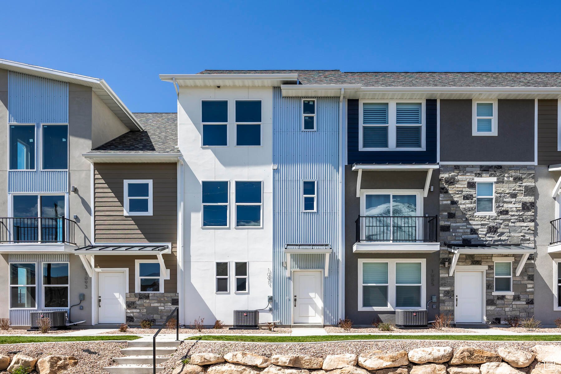 Beautiful two-bedroom townhome at the Ridge at Spanish Fork. Use our preferred lender and get a $10,000 credit for closing costs or a rate buydown. The Midtown has two ensuite bedrooms, a nice family room, and a large kitchen with a back covered deck. It has an extra deep one car garage with plenty of room for storage. The Ridge at Spanish Fork is a beautiful townhome community located on the east end of Spanish Fork. The Ridge has a clubhouse with a fitness center, an indoor/outdoor pool, new pickleball courts, and a dog park. The development is conveniently located near shopping (there is a grocery store across the street and Costco is just down the road), restaurants, schools, and only minutes from I-15 and the mouth of Spanish Fork Canyon. The Ridge offers two, three, and four-bedroom floor plans. There is new inventory available and we also work with investors. Come and tour the model home and choose your new townhome! The photos shown are of a finished Midtown plan and not of this specific townhome.