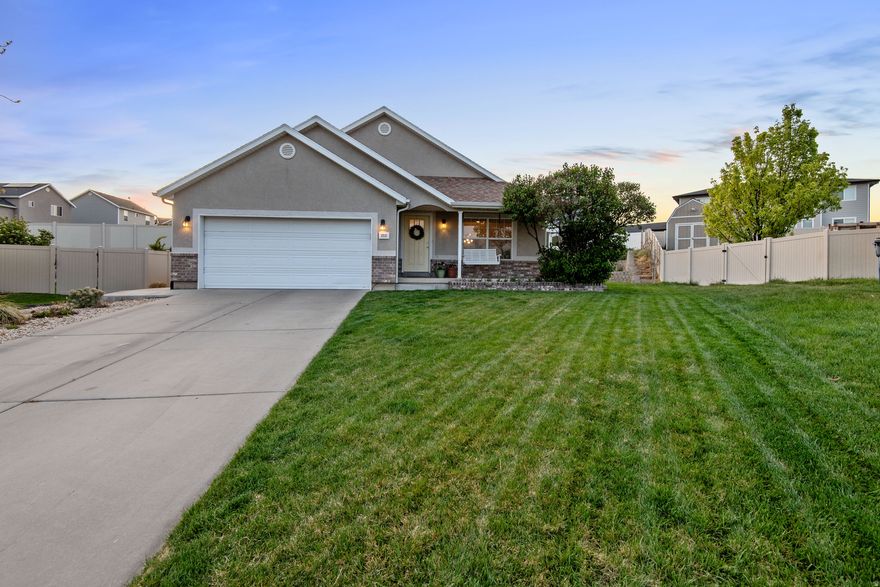 Come see the best quarter-acre home tucked away at the top of a cul-de-sac for under $600k! The backyard features a new in-ground trampoline with LED lighting, covered patio, playground, firepit, and storage shed with power. Enjoy your own slice of country living with a porch swing, egg-laying hens, a chicken coop, raised garden beds, and established grapevines that produce year after year. Mature shade trees and lush green lawn create the perfect setting for outdoor living and effortless entertaining. You will love being outside!  The main level offers an island kitchen, a spacious primary suite, two additional bedrooms, and two comfortable living areas. The basement provides flexible space for play, exercise, work, or hosting with it's two bedrooms and a full bathroom. The laundry room includes a utility sink, and the pantry is outfitted with ample shelving for organized storage.  Updates include new paint, LVP flooring, carpet, lighting, paint and a water heater in 2024.