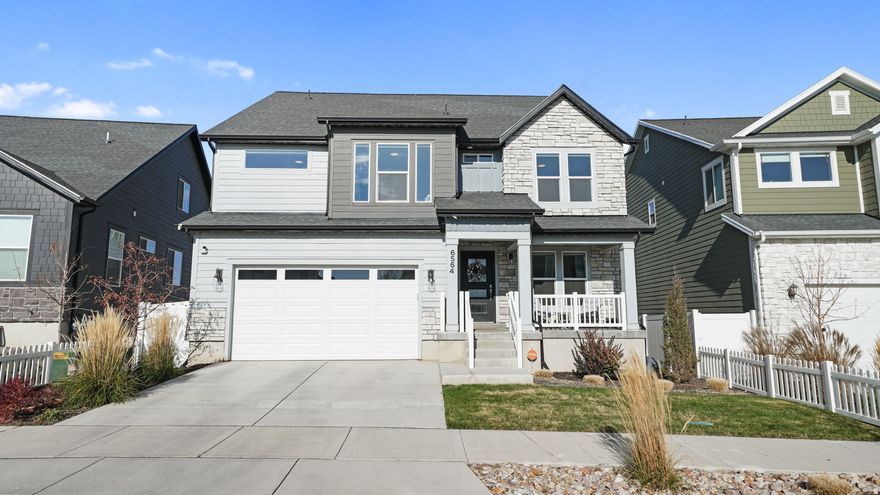 PRICE DRASTICALLY REDUCED + HOT TUB INCLUDED!  Start the new year with an exceptional opportunity on a home that is truly better than new. Now offered at $709,900 (reduced from $734,900!), this stunning Herriman property delivers premium upgrades you won't find in new construction-and the almost-new hot tub on the back patio is INCLUDED!  Step inside to a bright, open great room with extra-tall windows, a cozy fireplace, and a wide staircase with contemporary wrought-iron railing leading to the loft above. (The loft can easily be finished into an additional bedroom.)  The gourmet kitchen features a farmhouse sink, beautiful finishes, and flows seamlessly to the extended backyard deck-perfect for entertaining year-round. The spacious unfinished basement already has HVAC completed, giving you a valuable head start on future expansion.  Outside, every detail is complete: full landscaping, sprinkler system, vinyl fencing, and an extended cement patio spanning the length of the home. Enjoy permanent exterior accent lighting, an oversized garage with epoxied floors and finished walls, a whole-home filtered water system, and a 220 plug on the back patio for added flexibility.  The Vivint Security System stays-simply enroll in their monthly service and enjoy peace of mind.  With pristine condition, high-end upgrades, included hot tub, and a dramatic price reduction, this Peyton floor plan is a rare find at an unbeatable value.  Schedule your private tour today!   Square footage figures are provided as a courtesy estimate only and were obtained from county records .  Buyer is advised to obtain an independent measurement.