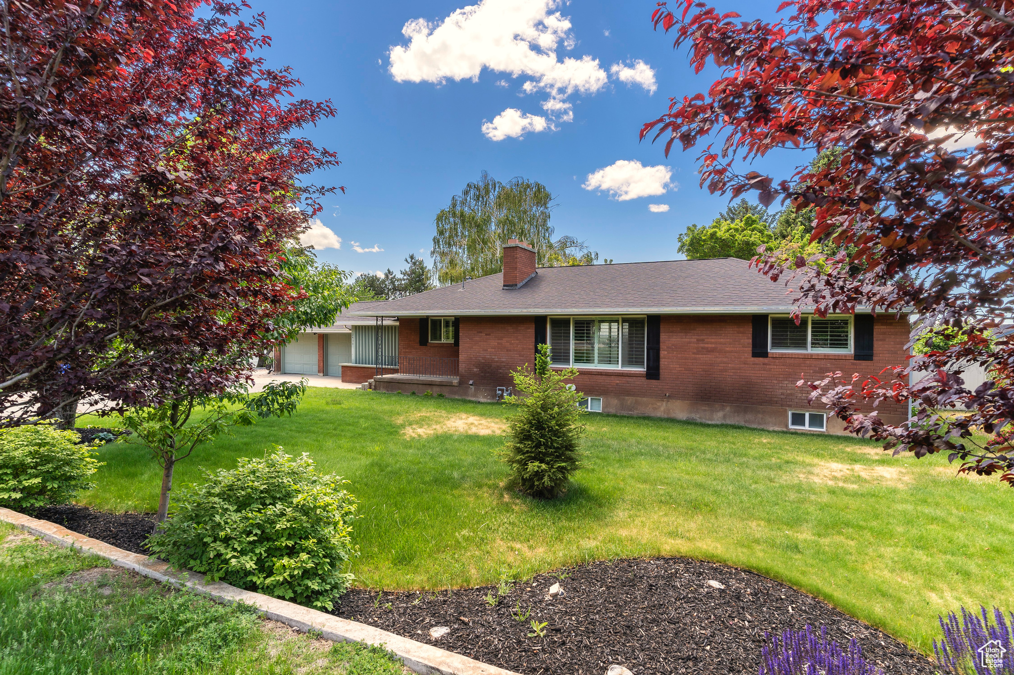 Picture yourself amidst the trees and open space sipping a glass of something wonderful on a warm summer's night.   This inviting home is tastefully updated throughout, kitchen and beautiful granite countertops, and plantation shutters that open to the incredible outdoor space. Appliances are stainless steel with a brand new range and new water heater.  The .68 acre fenced yard is the playground you've been yearning for.  Every type of fruit tree, a sports court, and a tree house make this the perfect playground for all ages. Place a hammock between 2 trees and you have the most peaceful feeling and mountain views you will never tire of.  Oversized 2 car detached garage with space for your RV, and tons of room for guest parking. Come visit this little slice of heaven and welcome yourself home.