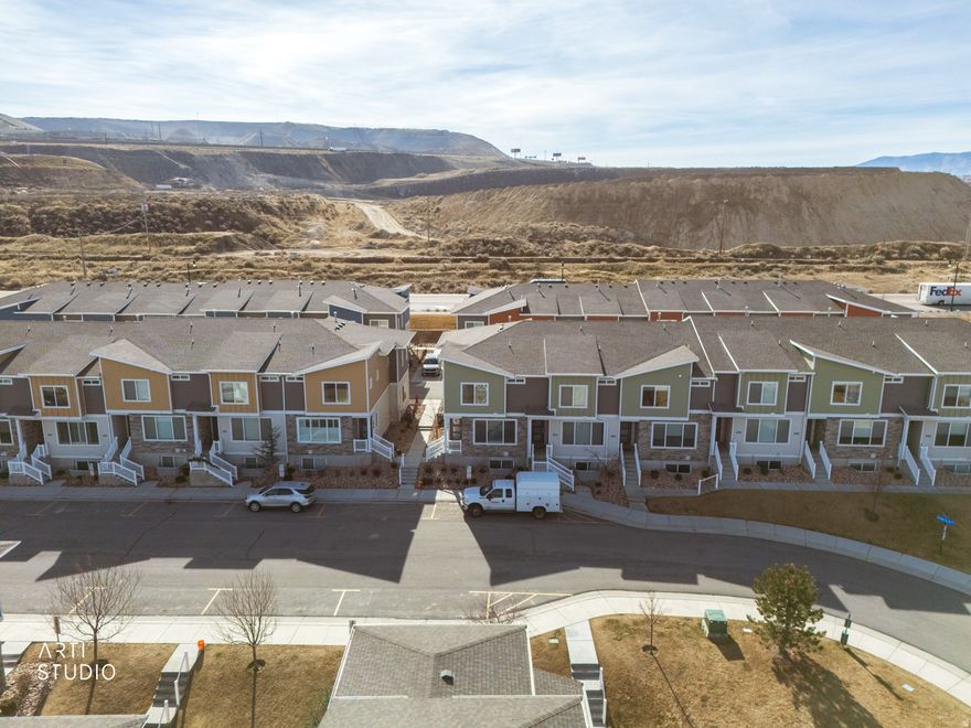 Welcome to this beautifully maintained townhome in one of Bluffdale's most convenient locations just 5 minutes to I-15, making commuting to Silicon Slopes, Salt Lake, or Utah County incredibly easy. As an exterior unit, this home offers added privacy and extra natural light that truly sets it apart. Step inside to an open, functional layout designed for comfortable everyday living and effortless entertaining. The updated kitchen features modern finishes, ample cabinetry, and great counter space. Upstairs, you'll find three spacious bedrooms offering flexibility for guests, family, or a home office setup. The home has been exceptionally well cared for and feels clean, bright, and move-in ready. Enjoy the convenience of a 2-car garage, plus access to fantastic community amenities. The HOA includes a pool, clubhouse, and parks, giving you resort-style perks without the maintenance. If you're looking for low-maintenance living, an ideal location, and a home that shows pride of ownership, this Bluffdale townhome checks all the boxes. Square footage figures are provided as a courtesy estimate only and were obtained from County records.  Buyer is advised to obtain an independent measurement.