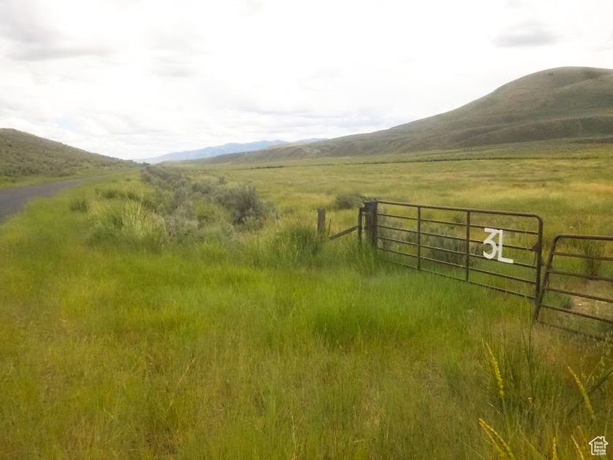 Incredible 136.5 acres nestled at the base of the Elkhorn Mountains with the Little Malad River running through the property! The river provides year round stock water for livestock and would make excellent pasture...as well as a beautiful homesite to build your dream home. There is great hunting and fishing on the property as well as in nearby reservoirs and public land! There are scenic mountain draws and about 80 acres of farmable land. This is a unique property providing year round live water and easy access to year round county maintained roads.  Come and relax and enjoy country living with beautiful views in every direction!