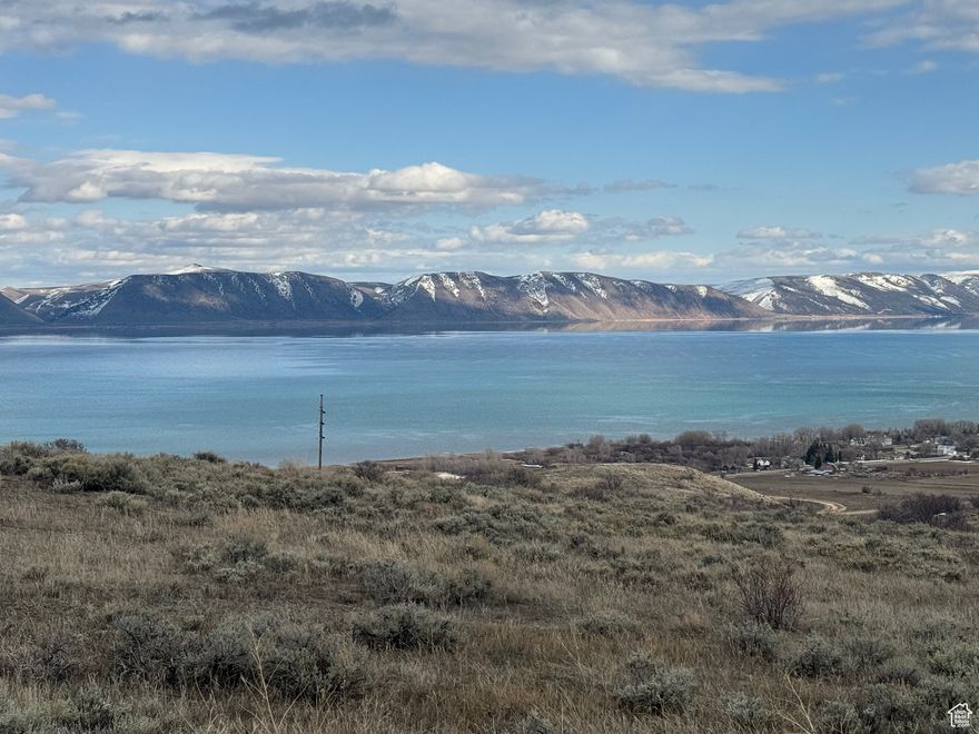 8.5 acre lot in the private, gated community of The Reserve at Bear Lake.  Views of Bear Lake, surrounding mountains and valley. Enjoy fantastic amenities--two pools (seasonal), hot tub (year round), splash pad, sports court, playground and gated beach access as well as access to beautiful Fish Haven Canyon for ATV/UTV, snowmobiling, snowshoeing, hiking and mountain biking.  All utilities stubbed; nightly rentals allowed.  Bear Lake awaits!