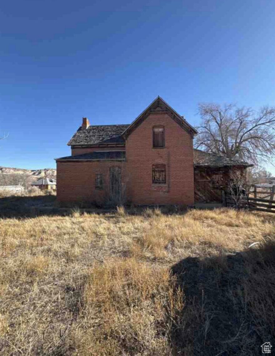 Lots to talk about here. Old pioneer with separate bunk house sitting on .62 of an acre just waiting to be brought back to life. Could be a great short term rental property once completed. There's tons of tourists that come through town on their way to all the hiking at the Grand Staircase, and Capitol Reef National Park. Home is being sold as-is.  Square footage figures are provided as a courtesy estimate only.  Buyer is advised to obtain an independent measurement.