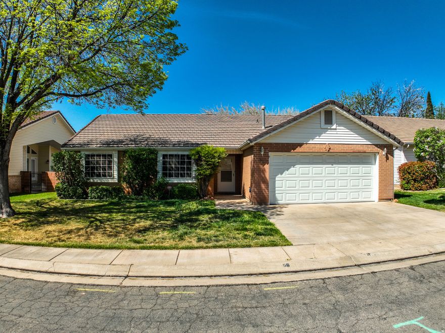 Come discover this charming home nestled in the quiet, tree-lined streets of Creekside. Enjoy relaxing on the covered patio--perfect for morning coffee or evening meals--and take advantage of the short walk to the community pool. Ideally located near shopping, dining, hiking, and biking trails, with everything St. George has to offer just minutes away. This 3-bedroom, 2-bath home also features a bonus office, plus updated A/C and water heater--making it a wonderful place to call home.