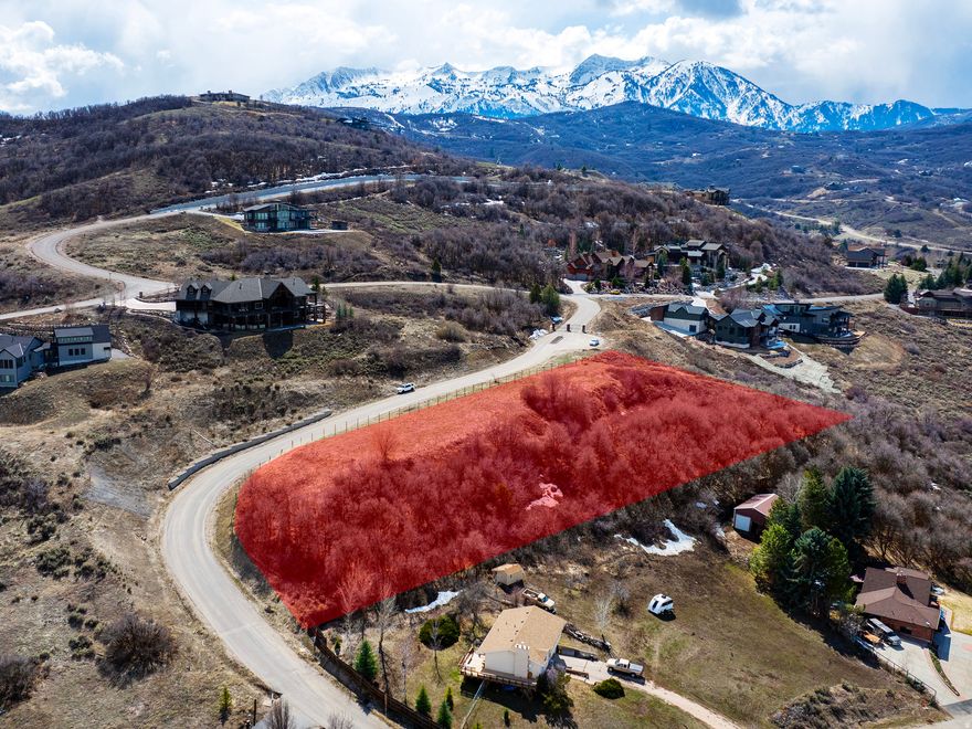 Create your ideal home on this remarkable 2.13-acre parcel in the heart of Ogden Valley. Situated in picturesque Huntsville, the property showcases expansive views of Pineview Reservoir and the surrounding Wasatch Mountains, offering an absolutely stunning backdrop. Whether you're planning a contemporary mountain retreat or a year-round residence, the unmatched scenery alone makes this opportunity stand out. Located just minutes from Snowbasin Resort and a short drive to Powder Mountain, this property is perfectly positioned for adventure in every season. Enjoy skiing and snowboarding in the winter, along with hiking, biking, and lake activities throughout the warmer months-all just outside your doorstep. Pineview Reservoir is nearby for summer boating and paddleboarding, while the serene surroundings provide year-round beauty and recreation. With no HOA, you'll have the flexibility to design and build without restrictive oversight. A geo-technical study has already been completed, and water connection fees have been paid, giving you a valuable head start on construction. The lot offers convenient year-round access, along with a rare combination of privacy and close proximity to everything Ogden Valley has to offer. This is an exceptional opportunity to own prime land in one of Northern Utah's most sought-after areas-don't let it pass you by. *All property information, boundaries and documents to be verified by buyer.