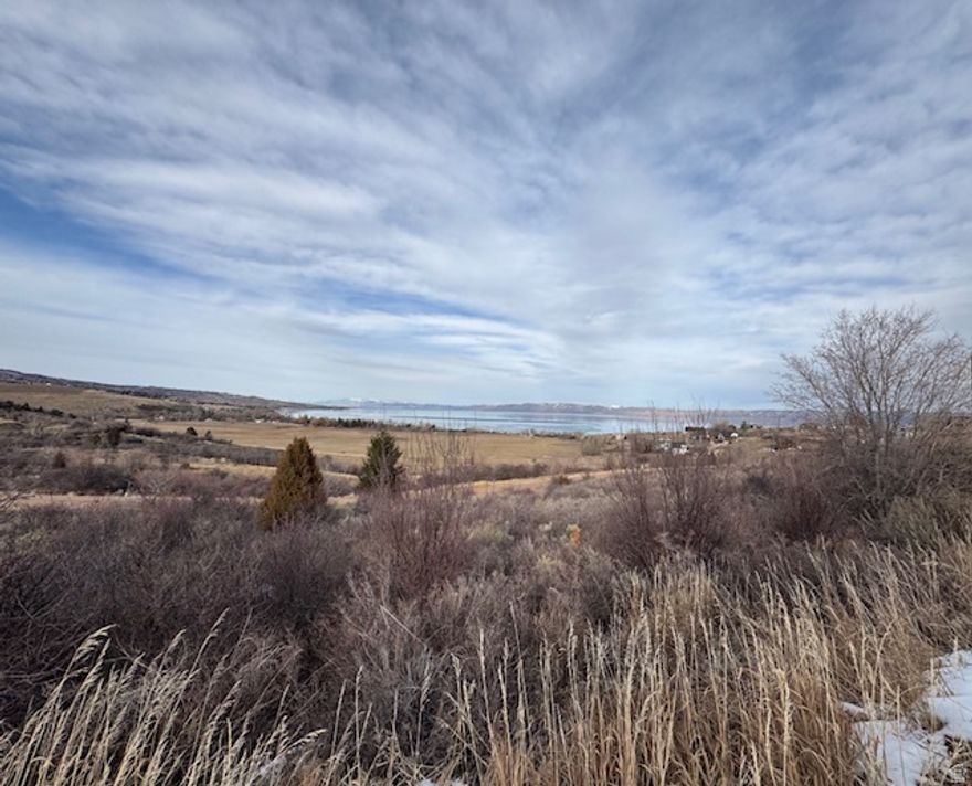 Unobstructed views that will never be blocked set this Swan Creek Village lot apart from the rest. Build with confidence knowing your sightlines are protected and your Bear Lake views are here to stay. No nightly rentals here and that's exactly the point. Swan Creek Village is designed for owners who want fewer suitcases rolling by and more time actually enjoying Bear Lake. The result? A quieter, more neighborly atmosphere where weekends feel like vacations again. Buyer to verify all information.