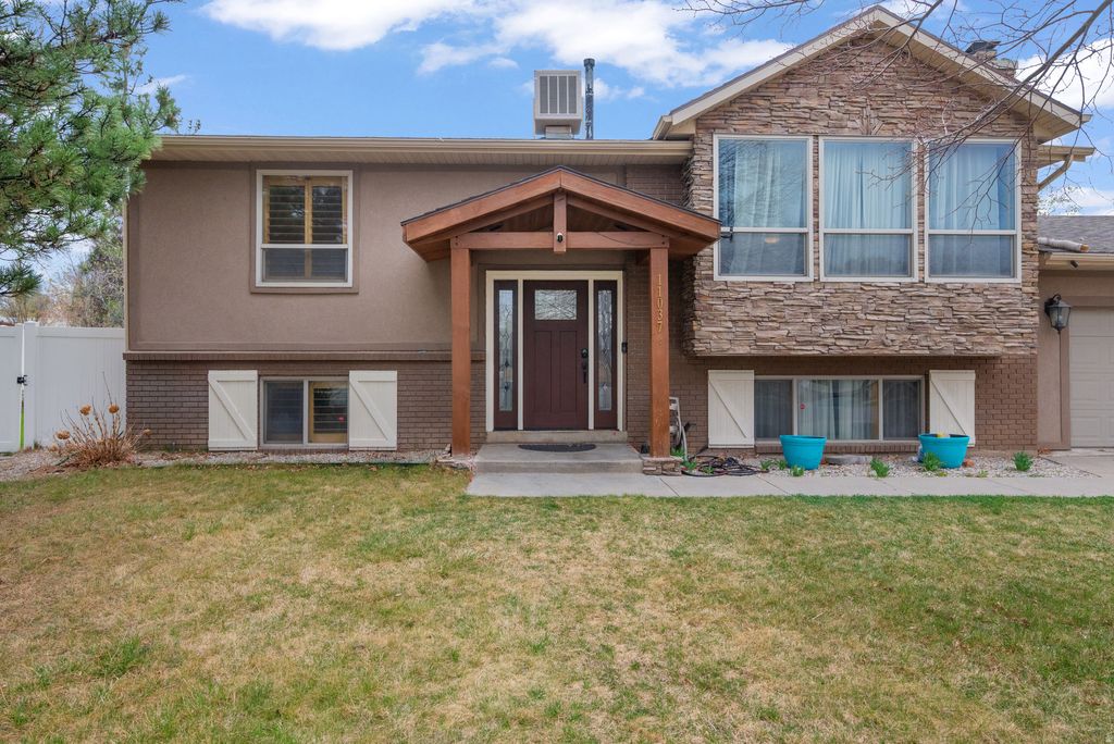 Photo of 11037 S ROBINSON CIR E, Sandy, UT 84092 (MLS # 2147046)