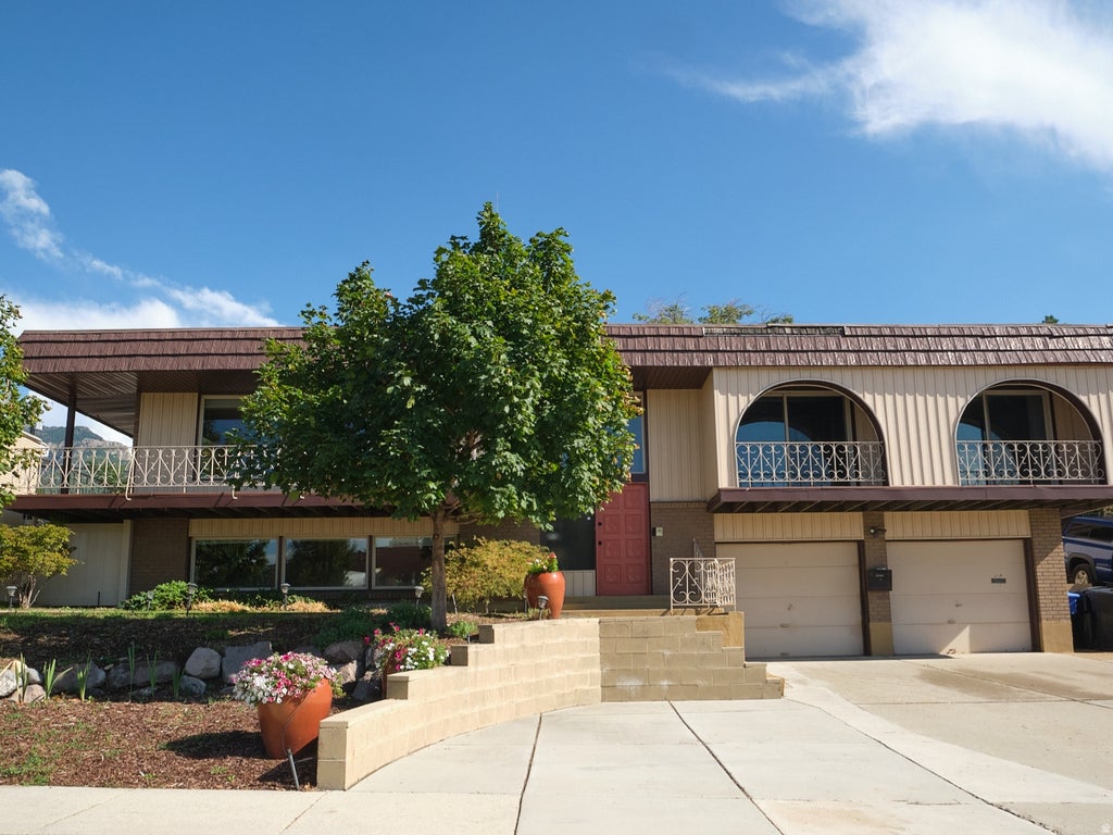 Photo of 2546 E CAMPUS DR, Cottonwood Heights, UT 84121 (MLS # 2180702)