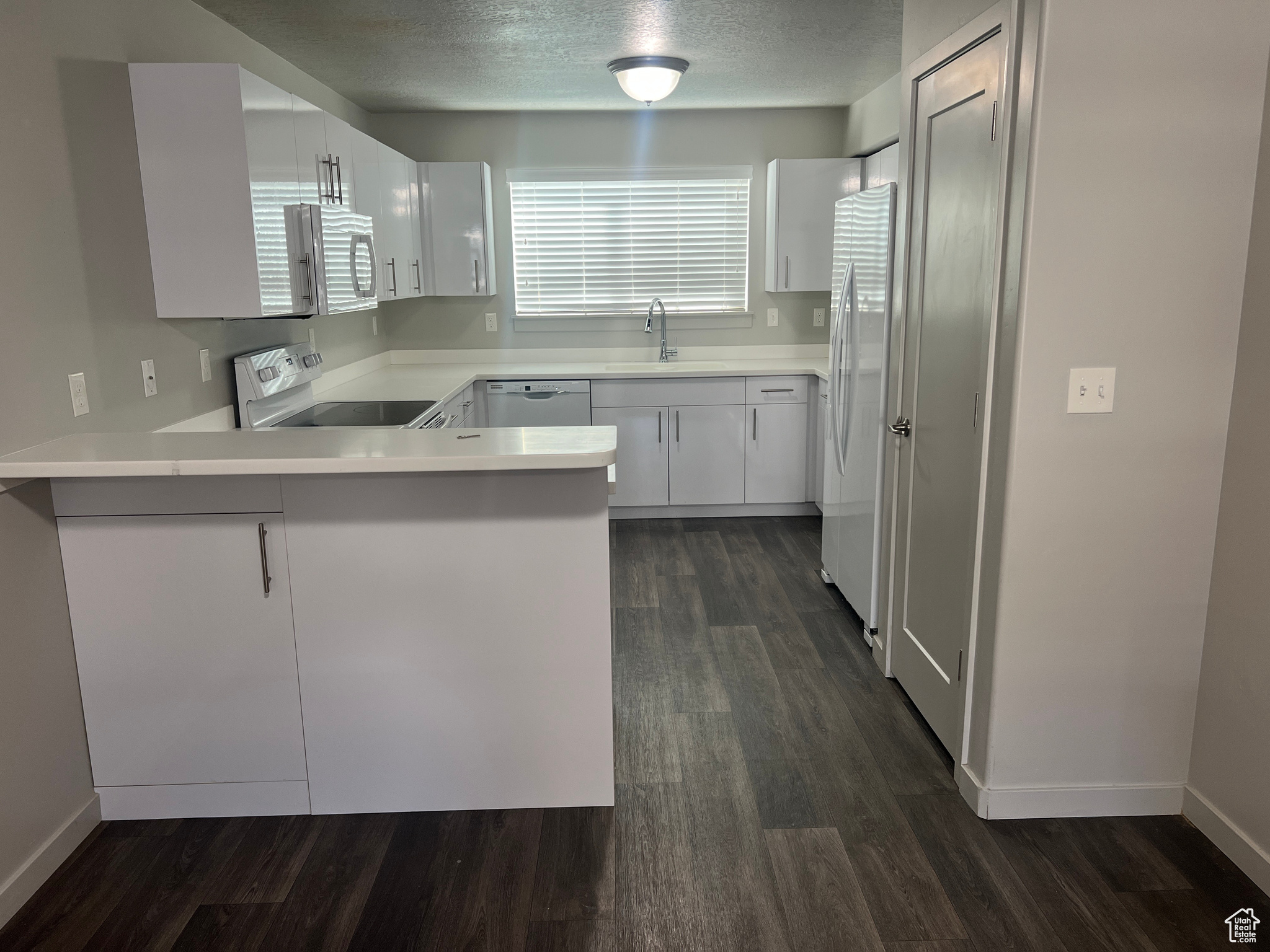 Welcome to this newly painted and clean clean clean, middle floor condo at Running Horse. North facing unit, great for cooler summer temps and warm winter sun on the south side. Prime location just minutes from University Parkway, I-15 access, UVU, Shopping & Dining. All appliances included and move in ready. FHA approved development.