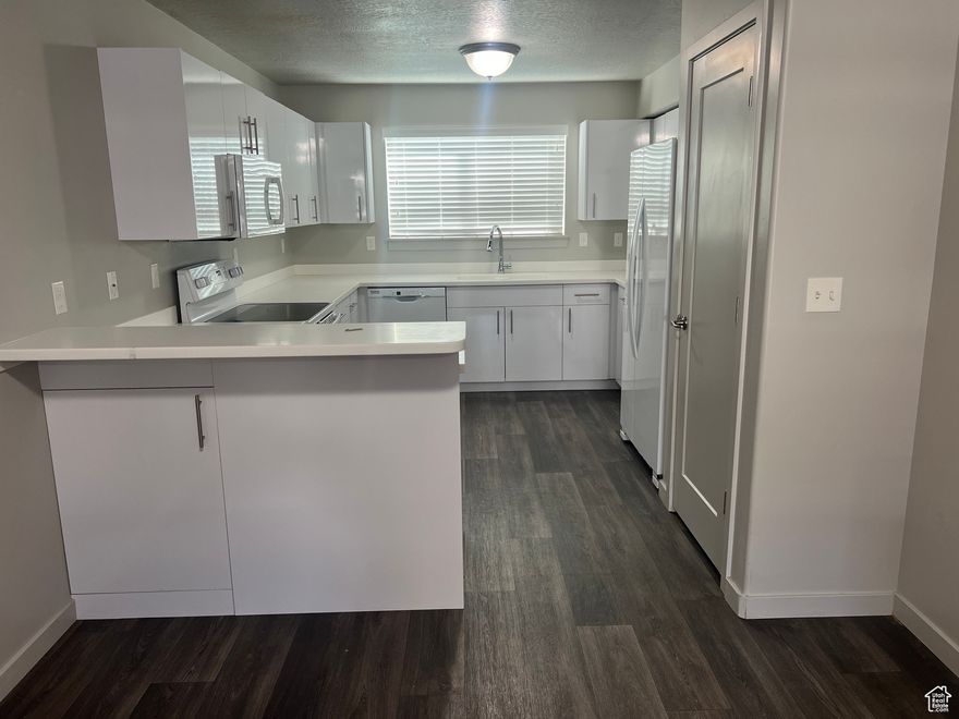 Welcome to this newly painted and clean clean clean, middle floor condo at Running Horse. North facing unit, great for cooler summer temps and warm winter sun on the south side. Prime location just minutes from University Parkway, I-15 access, UVU, Shopping & Dining. All appliances included and move in ready. FHA approved development.