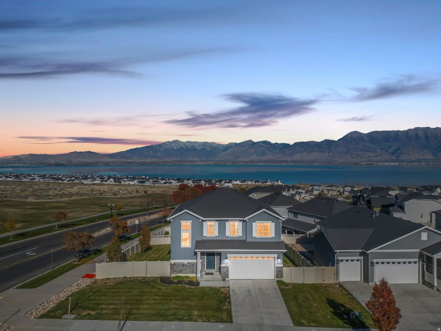 Welcome to your front-row seat to Utah's best views! Nestled in the heart of Saratoga Springs, this spacious 4,000 sq ft home offers jaw-dropping vistas of the mountains, Utah Lake, and the entire valley - the kind of views that make sunsets feel like a nightly event.  Step inside to find bright, open living spaces, soaring ceilings, and a layout designed for comfort and style. The kitchen is the perfect gathering place - whether you're whipping up breakfast with the sunrise or hosting dinner parties under a glowing evening sky.  Upstairs, the primary suite is your personal retreat, complete with those same sweeping views that'll have you pinching yourself. Two more bedrooms and a flexible loft space mean plenty of room for family, guests, or your next great idea.  The unfinished basement is a blank canvas - gym? theater? guest suite? You decide! Sitting proudly on a corner lot, this home offers extra privacy and curb appeal that stands out from the crowd.  So grab your camera (and your moving boxes) - because homes with views like this don't stay secret for long!   Location: Saratoga Springs, UT  Views: Mountains  Lake  Valley  Beds: 3 Baths: 2.5 Sq Ft: 4,000  Basement: Unfinished Lot: Corner   Square footage figures are provided as a courtesy estimate only and were obtained from previous appraisal. Buyer is advised to obtain an independent measurement.