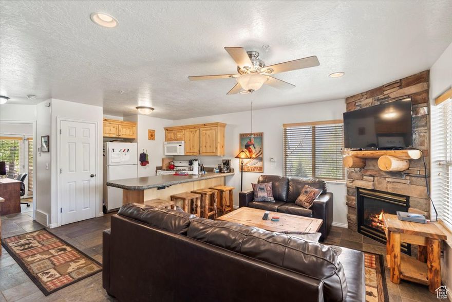 This is a unique and super useful setup with a rare  FOUR (4)-BEDROOM Townhome with Stunning Valley Views in Eden, Utah at a great price. Welcome to your mountain escape in the heart of Eden! This rare 4-bedroom, 3-bathroom fully furnished townhouse offers a spacious and flexible layout that's perfect for full-time living, vacation getaways, or high-demand short-term rental income. Enjoy panoramic views of the Ogden Valley and a prime location just minutes from world-class skiing at Powder Mountain and Snowbasin. Imagine having your choice : is it skiing fresh powder, hiking, or mountain biking at 3 different ski resorts, 18 hole championship golf course across the street, or smooth morning glass on the Pineview reservoir? (I've also witnessed hot air balloons in the early mornings.) This is all just minutes away! If you're feeling like a homebody, you still have your choice of the community pool, jacuzzi/sauna, exercise room, the game room at the clubhouse, and volleyball courts in the complex. Directly across the street from an 18-hole championship golf course, this home places recreation at your doorstep year-round. Inside, you'll find open living areas, generous bedrooms, and plenty of natural light throughout. Again, as part of a well-maintained community, you'll have access to top-notch amenities including a sparkling pool, sauna, biking and hiking trails, BBQ and picnic areas, and multiple playgrounds-ideal for both relaxation and adventure. With one of the few four-bedroom layouts available in the area, this townhome is a rare opportunity for mountain living or a turnkey investment in a spectacular setting. Square footage figures are provided as a courtesy estimate only and were obtained from county records. Buyer is advised to obtain an independent measurement.