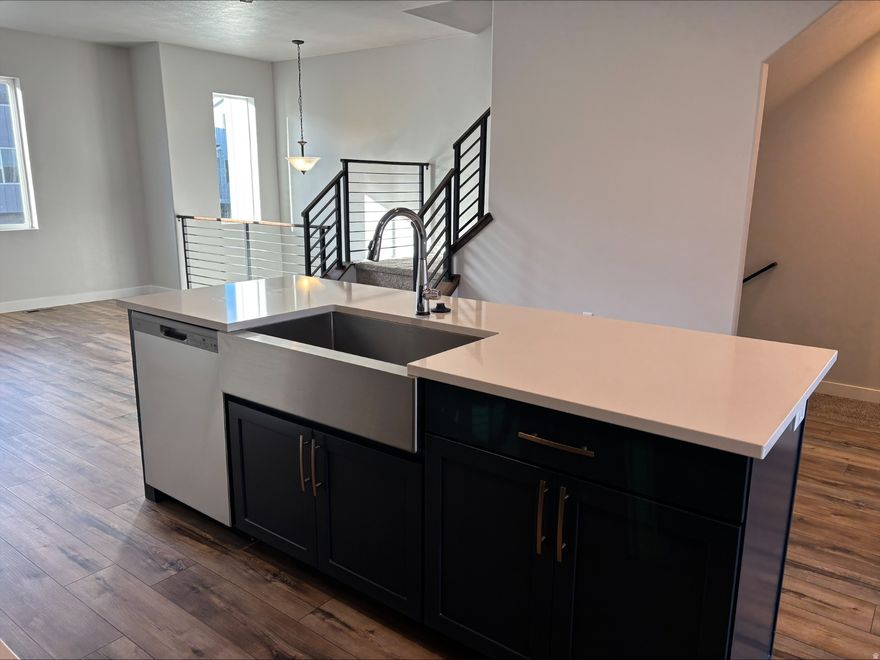 NEW community by Woodside Homes - MEADOWBROOK. In a highly sought after location - close to Front Runner, Freeway access, shopping, dining, and everything you need! Our HILLSBOROUGH plan - featuring 4 bedrooms, 9' ceiling on main floor, open family/dining/kitchen layout. Open railing, granite/quartz tops throughout, wood laminate, tankless water heater & more! Home is complete!  Call/Text for more info. Ask about our preferred lender incentives. Pictures are of the actual home.