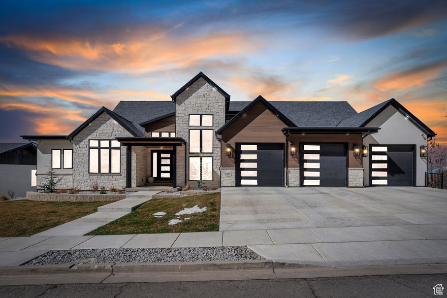 Perched on a breathtaking Mountainside, this one-of-a-kind luxury home offers unparalleled floor-to-ceiling Views of the Valley. Completed in Feb. 2024, this stunning 9,027-square-foot estate includes 5 bedrooms and 6 bathrooms designed with the finest finishes. Expansive Patios on three levels provide the perfect space for outdoor relaxation, while a brand-new Pool adds to the home's resort-style appeal. Inside, entertainment abounds with a Game Room featuring a pool table, ping pong, and foosball, as well as a Theater Room with luxury seating. Fitness enthusiasts will appreciate the indoor Basketball Court and Exercise Room with mirrored walls and rubber flooring. The gourmet Kitchen is a chef's dream featuring a butler's pantry, pebble ice maker, double ovens, gas range with kettle faucet, double fridge, granite countertops and an appliance closet. Cozy up by the Gas Fireplaces in the Great Room & lavish Primary Bedroom Suite, which also includes a private balcony, walk-in closet with built-ins, a soaker tub, a smart shower, and even a urinal. Two additional Secondary Suites offer oversized closets and dual vanity bathrooms for ultimate comfort. Modern conveniences such as Sonos speaker system throughout the home, central vacuum, a backup generator, built-in gun safe, water fountains, remote blinds and laundry rooms on two levels make this home as functional as it is luxurious. This extraordinary residence redefines mountain living with its unmatched amenities and breathtaking views.