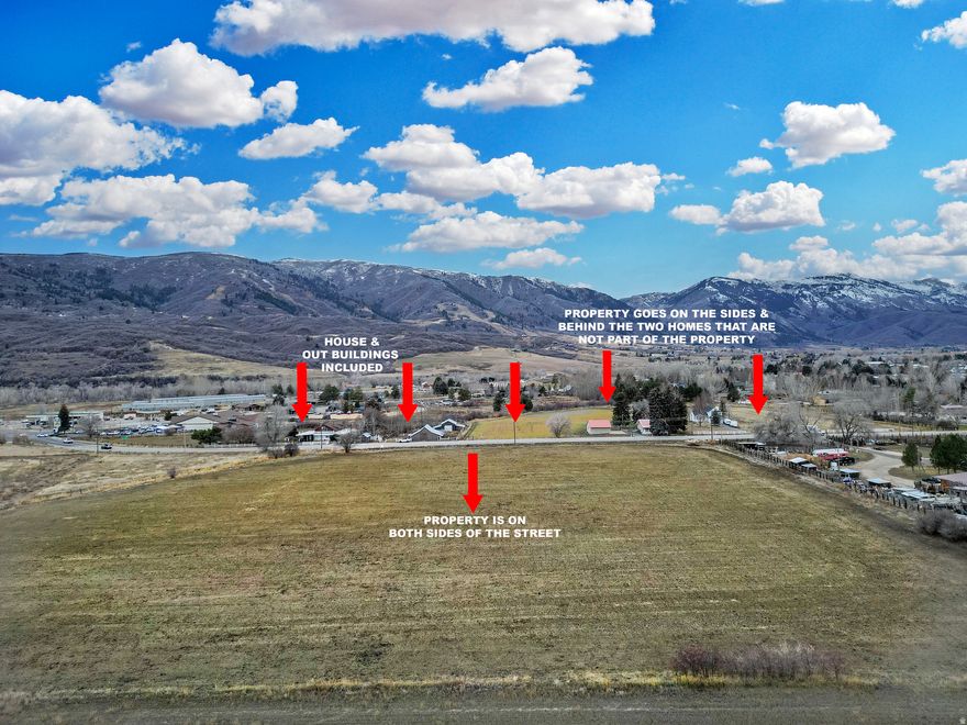 Opportunities like this are increasingly rare in the Ogden Valley. This exceptional 16.77 (see additional land listing)-acre parcel, centrally located in Eden, offers a powerful combination of location, land, and long-term potential-surrounded by three world-class ski resorts, two stunning reservoirs, and a premier golf course, and countless hiking trails that wind through breathtaking mountain peaks in one of Northern Utah's most desirable and supply-constrained markets.  The property includes a well-loved home offering 3,355 square feet, four bedrooms, one full bath, and two three-quarter baths, along with an attached two-car garage, deck, and patio. The home carries undeniable charm and character and is ready for its next chapter-whether that means restoration, repurposing, or serving as a comfortable residence while future plans take shape.  Adding even more value are four outbuildings, including two large barns, creating flexibility for storage, agricultural use, hobby farming, or interim income opportunities. The existing improvements allow a buyer to live on, lease, or utilize the property immediately while thoughtfully planning what comes next.  While the home is special, the true value lies in the land itself-its acreage, central Eden location, and the unmatched lifestyle and development potential that Ogden Valley continues to offer. Whether held as a legacy property, positioned for future development, or enjoyed as a private estate surrounded by open space and mountain views, this property represents a strategic investment in one of Utah's most iconic valleys.  Property consists of two tax identification numbers: 22-046-0018 and 22-045-0016, offering additional flexibility and potential. Buyer to verify all information to be deemed true and correct.   Land like this is finite. Vision like this is powerful.
