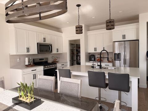 Tiny photo for 6537 W YAWKEY WAY S #107, Herriman, UT 84096 (MLS # 2120632)