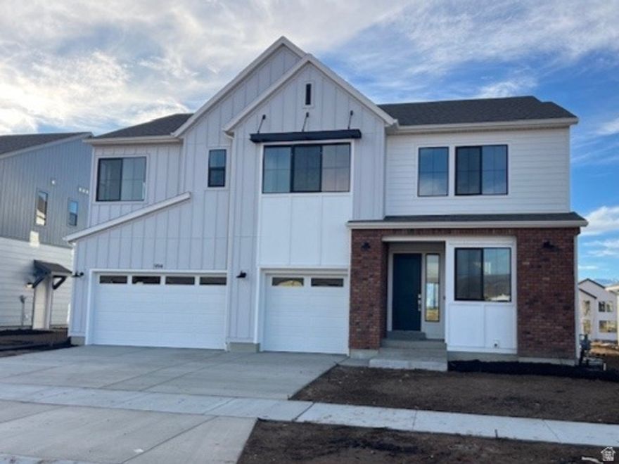 TRIPOINTE QUICK MOVE-IN HOME on lot 239! Experience stunning views of Mt. Timpanogos in the peaceful community of The Crossings at Lake Creek. Whether you're relaxing on the covered patio, unwinding in the expansive great room, or retreating to the elegant primary suite, you'll be surrounded by natural beauty. The chef-inspired kitchen, featuring an oversized island, is ideal for hosting and entertaining. Designer-selected finishes by an award-winning team bring style and sophistication, enhancing the home's serene setting. This thoughtfully designed home offers four spacious bedrooms, three beautifully finished bathrooms, a separate office, and an unfinished basement ready for your personal touch. Square footage figures are provided as a courtesy estimate only and were obtained from Builder. Buyer is advised to obtain an independent measurement.