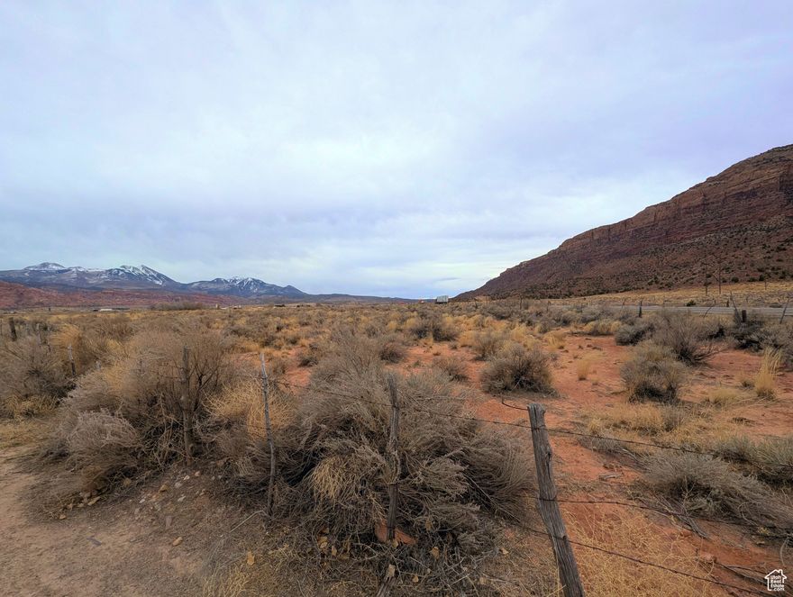 Last of the Last AG parcels with this 8. 54 Acres located in the entrance of Moab & San Juan County. Nice views, highway access. South end of property is corner of Old Airport Road. Runs North to approximate fence line.