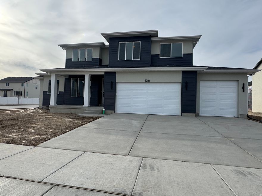 Discover an exquisite new construction home located on the Payson- Salem border, Utah, designed to impress. Step into the stunning two-story living room, where expansive windows flood the space with natural light and create an inviting atmosphere. The chef-inspired kitchen boasts a generous island and a spacious pantry, all adorned with beautiful upgraded finishes that elevate the home's elegance.The luxurious primary bedroom is thoughtfully situated on the main floor, offering a serene retreat complete with a roomy closet and a spa-like ensuite bathroom. Ascend to the upper level, where a versatile loft/play area overlooks the living room, providing a perfect spot for relaxation or play. This level also features three additional bedrooms, each with walk-in closets, ensuring ample storage space. The shared bathroom is impressively spacious and includes convenient double vanities.This home combines modern amenities with a warm, welcoming design, making it the ideal choice for families seeking comfort and style in a vibrant community. Don't miss the opportunity to make this dream home yours!