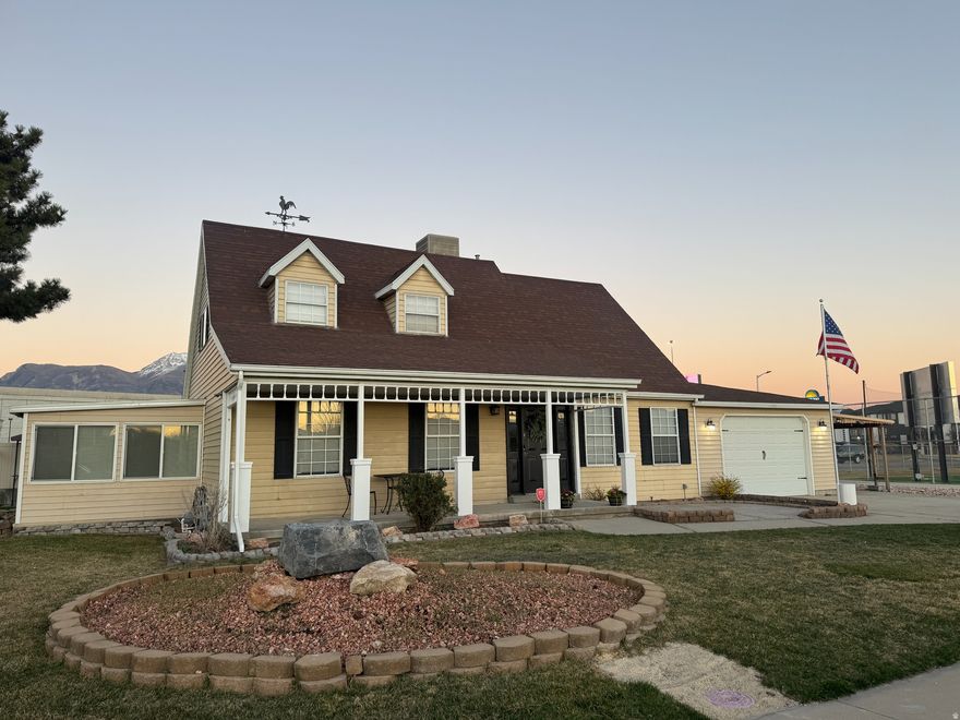MUST SEE!! This house is in the heart of Lehi! Views of the mountains and the Lehi Roller Mills make you feel at home. This Cape Cod style home is full of charm and comfort! The bright, inviting living spaces create a warm, cottage-style feel throughout the home. The open yard offers plenty of space to relax, or entertain guests.  Conveniently located near Lehi's shops, dining, parks, and commuter routes, this home is perfect for anyone seeking a comfortable retreat in a prime location.  In addition to the home's charm, you'll appreciate the ample space for vehicles, ATVs, and recreational toys. The property also features a nicely sized tool shop and a separate powered workspace that could serve as a salon, studio, or small home business.  A unique opportunity with flexibility, function, and cozy appeal!  Recently updated HVAC.  Square footage figures are provided as a courtesy estimate only and were obtained from County Records.  Buyer is advised to obtain an independent measurement.