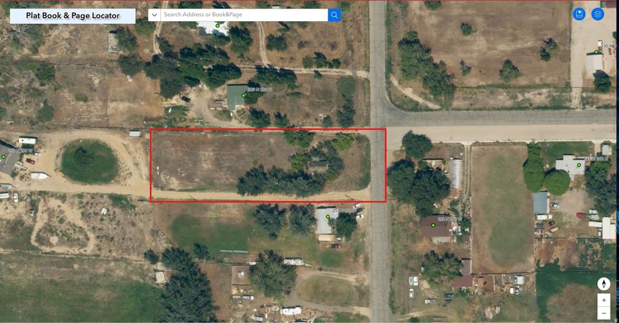 This is a building lot that features an old cabin, which is not habitable. The sewer and water services are connected to the lot, but the seller is unsure of their condition. Please note that the address is approximate and will need to be verified.  Power service is Rocky Mountain.