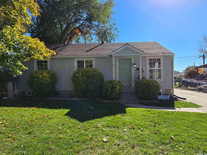Welcome home to this beautifully updated 5-bed + office American Fork gem, perfectly designed for comfortable living, connection, and room to grow. Step inside to an inviting layout filled with natural light, new flooring, fresh paint, and modern finishes throughout. The kitchen is cozy, charming, and newly updated with brand new appliances, creating a warm heart-of-the-home feel while keeping the main living spaces open and bright.  You'll love the two beautifully updated bathrooms and the flexibility of five true bedrooms plus an office/flex room-ideal for work, guests, play, or a growing household. Separate living and family rooms offer space for quiet evenings upstairs and game nights downstairs. Comfort comes easy with a newer furnace, A/C unit, and water heater, plus the convenience of a single-car garage.  One of this home's most unique advantages is the private gated access to the beautiful park directly behind the property-allowing you to step from your backyard straight into open green space for play, picnics, sports, and peaceful evenings without ever crossing a street.  Turn-key, welcoming, and ideally located near parks, schools, shopping, and AF amenities-this is the home where your next chapter begins.