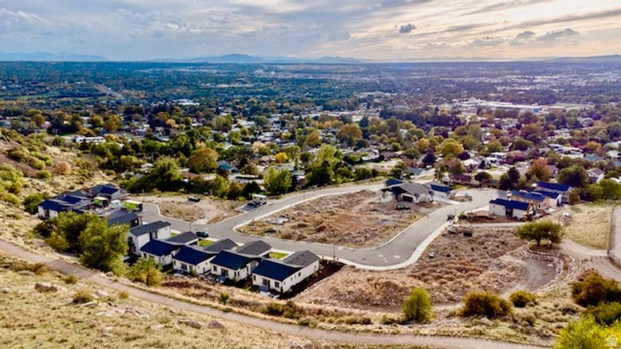 Welcome to your dream home in the new Valley View subdivision nestled on Ogden picturesque east bench, with NO BACKYARD NEIGHBORS offering the perfect blend of modern luxury and outdoor adventure. Our 2 story XL plan features a larger kitchen area and is custom built to boast breathtaking panoramic views and provide direct access to scenic hiking trails, inviting you to embrace the beauty of nature right outside your doorstep. Upgrades and views everywhere you look! The sleek kitchen is a chef's delight, equipped with premium appliances, stylish cabinetry and ample counter space flowing into the the main living area with tons of natural light and a bonus deck with mountain views. A walk-in closet in the master with a separate soaking tub and balcony. Absolutely must see. Ask about special lender incentives!