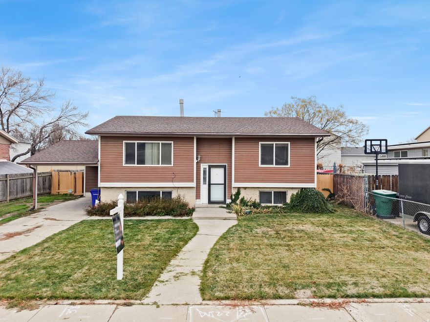 An Investor's Dream! This 4 Bedroom 2 Bath Home has Tons of Potential, Solid Bones and a HUGE upside! With an ADU Mother-in-Law Apartment featuring Daylight Windows & a 2nd Basement Entrance, you can RENT out the basement while living upstairs, or vice versa! The Roof was replaced roughly 15 years ago, and the Windows were replaced about 25 years ago. Featuring a Double-Sided Fireplace, a Covered Deck Large Backyard & RV Parking... You definitely don't want to miss out on this Money Maker!