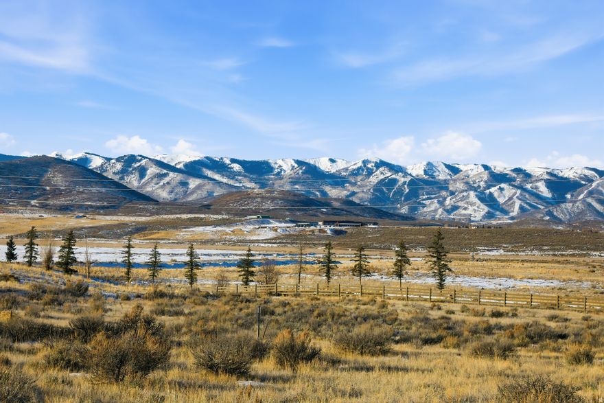 Ski Resort Views in Promontory - Enjoy uninterrupted mountain views and no homes behind you from this 1.08 acre lot in Promontory. This very gentle-sloping lot should offer a very easy build, and over a half an acre of building envelope space will give you plenty of room to build up to 8,000 sqft of livable space and all the garage and outdoor space you can fit. Pre-approved plans for a 4,400 sqft home are also available. The very close proximity to the gatehouse means quick access into town or SLC, and very close and easy access to the trail system connects you to Promontory's award-winning clubhouses. Available club membership offers access to Promontory's world-class amenities. Enjoy private dining in SIX different restaurants on property. ELEVEN different clubhouses offer endless activities for the whole family, including private ski lodges at Deer Valley and Park City ski resorts. Promontory Club offers pools, tennis, fitness, spa, fishing, hiking, biking, golf, bowling, basketball, beach club, tubing hill and more! Play up to 8 rounds of golf per person per year. Contact list agent for more details.