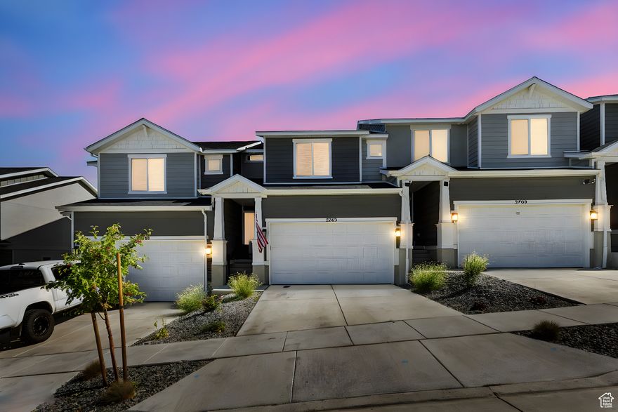 THIS AMAZING HOME IS FEATURED ON REAL ESTATE ESSENTIALS ABC 4 UTAH. This nearly-new townhome blends modern designate,smart tech,and muntain views into one irresistible package. With 3 bedrooms, 2.5 baths and 2,187 sq ft of living space,including a full unfinished basement, this home offers room to grow, create and invest. Sleek open-concept kitchen with silverstone countertops, gas range, stainless steel appliances, 2 car garage, central air and double pane energy-efficient windows, fully fenced yard with patio.This short sale is more than a transaction, it's a transformation. Whether you're a visionary buyer or a strategic investor, this property offers instant potential in a rapidly growing area.The community amenities elevate every day living.