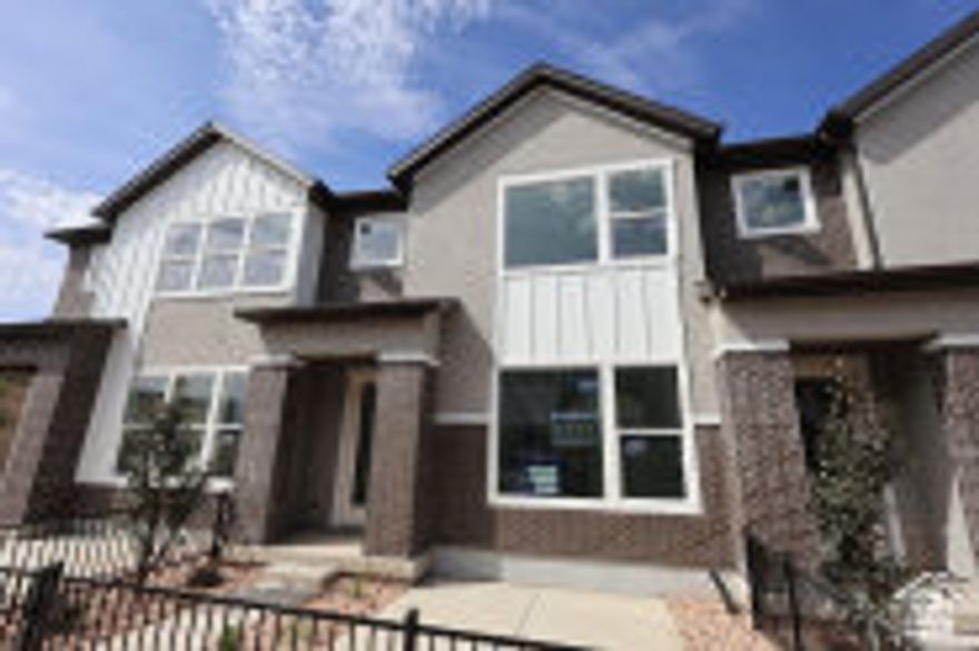 Move in Ready - Gated community! Community perfectly positioned near scenic parks, shopping, and favorite local dining spots. Just minutes from downtown Salt Lake City and the airport, this prime location truly has it all. Step inside to an inviting open-concept main level that feels instantly warm and welcoming-ideal for gatherings, celebrations, or quiet evenings at home. Enjoy everyday convenience with your modern kitchen located right off the garage-no more lugging groceries upstairs! At day's end, retreat to your spacious owner's suite featuring an impressive walk-in closet and a serene atmosphere designed for relaxation. A versatile loft provides extra space for work, play, or unwinding, while two additional bedrooms offer cozy comfort for family or guests. Every element has been thoughtfully designed-from premium finishes and energy-efficient features that help lower monthly costs to the confidence of an award-winning builder's warranty. This home isn't just move-in ready-it's ready to move you.