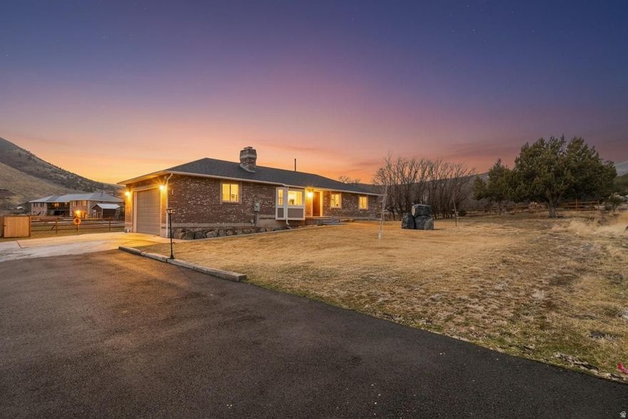 You'll love this brick rambler with space, views, and the freedom to live a little differently.  Set on 2.5 acres of usable horse property, this 6-bedroom, 2-bath rambler offers the rare balance of open land and everyday convenience. From here, you can saddle up and ride mthe nearby trails, and still be just 10 minutes from major highways, shopping, restaurants, and entertainment.  Inside, the home has been updated and includes a flexible layout designed for real life. Six bedrooms provide room to grow, host, or create dedicated office and hobby spaces. The walk-out basement opens directly to the property, creating seamless indoor-outdoor living and future possibilities. Step outside and the lifestyle truly unfolds.  A deck frames sweeping mountain views - the kind that make early mornings and golden-hour evenings unforgettable. Below, a large custom patio sets the stage for gatherings, summer barbecues, or quiet evenings under the stars. The property is thoughtfully equipped for country living:  2.5 acres of usable land  Horse property with nearby trail access  Small barn  Chicken coop  Abundant parking for trailers, RVs, and equipment Whether you envision horses in the pasture, a small hobby farm, or simply more space to breathe, this property delivers the setting to make it happen. Country living. Mountain views. Trail access. And still close to everything.