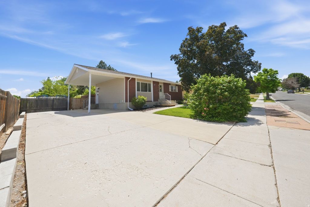 Photo of 3671 JODIE LN, West Valley City, UT 84128 (MLS # 2162850)