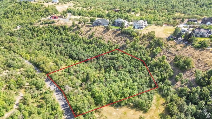 Beautiful 2.29 acre lot in Elk Ridge, designated in the recent Elk Ridge General Plan as Residential and Livestock (R&L-1-20,000) Zone. Buyer to verify all info. Adjacent 3.41 acre parcel available as well MLS 2101888.