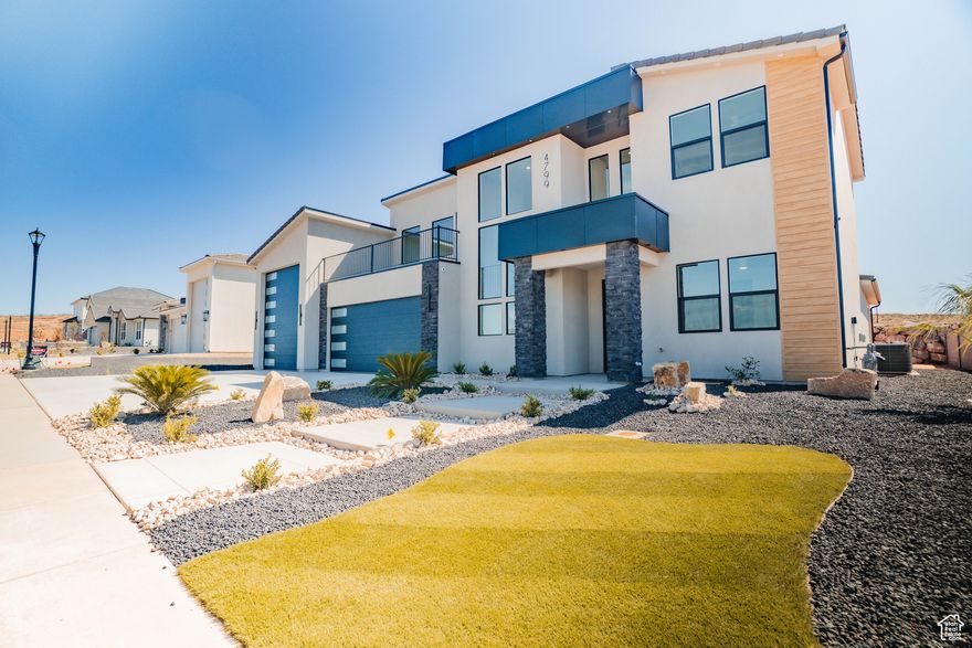 ~Full Custom Home Near Sand Hollow~ Builder Incentives Available! This stunning Big Rock Homes home in the sought-after Sand Hollow Village area blends modern comfort with the ultimate recreational lifestyle. This home has a massive 52-FOOT DEEP RV GARAGE (12' wide x 14' tall door)! Inside, you'll find an open-concept layout with LUXURY FINISHES, spacious bedrooms, and LARGE BACKYARD WITH ROOM TO ADD A POOL! This property comes equipped with premium SMART HOME features including 3 wired in insecurity cameras and a door bell camera. Just minutes from Sand Hollow Reservoir, Sand Hollow Golf Course, the sand dunes, and Zion National Park, you're surrounded by year-round adventure - boating, biking, hiking, off-roading, and more. Contact listing agent for PRIVATE SHOWINGS.