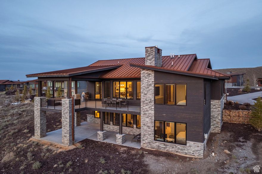 Welcome to your dream home in Promontory Club. Offered fully furnished with a full golf membership available. This stunning newer construction home sits above the first hole of the Jack Nicklaus Signature Golf Course, one of the few homes on this street boasting breathtaking ski mountain views. The thoughtfully designed Russell floor plan offers a spacious open-concept great room with tall vaulted ceilings, rich natural light throughout the home, and seamless indoor-outdoor flow. A chef's kitchen, equipped with high-end Wolf and Sub-Zero appliances, is perfect for entertaining or quiet evenings at home. Two bedroom suites are located on the main level for easy, comfortable living. This home is equippedwith radiantheating in each bathroom and forced air heatthroughoutproviding year-round comfort. The main level features a covered deck with a built-in barbecue, perfect for enjoying the stunning views of the golf course and mountains. Downstairs, you'll find a large game and media room, a secondary living area, three spacious bedrooms, and a walkout covered patio that offers more outdoor space. This home has been gently lived in, used only a few weeks per year, and is in pristine, like-new condition. Enjoy direct access to Promontory's world-class amenities. Just steps away is the Nicklaus Clubhouse, The Peak restaurant, with the brand-new Lavender Spa coming soon. You are a short walk from the family-friendly Beach Club, which features pools, lakes, dining, a dog park, and a tubing hill in the winter. Additional amenities include golf courses, fine dining, fitness centers, pools, tennis courts, pickleball, bowling, and ski lodges with shuttles to Deer Valley and Park City Mountain. With gorgeous views, an exceptional floor plan, and an unbeatable location, this home is a rare find in Promontory.