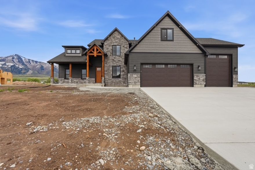 This is a "to be built" listing for a high end custom home with INCREDIBLE views. This thoughtfully designed home offers a stunning great room with soaring 18' ceilings and a floor-to-ceiling fireplace as the centerpiece. The gourmet kitchen is built for both function and style, featuring a custom hood, gas cooktop, double wall ovens, and a massive walk-in pantry. The main-level primary suite includes dual vanities and an oversized shower with three shower heads for a true spa-like feel. A dedicated front office adds flexibility for work or study. Upstairs, you'll find three additional bedrooms plus a spacious loft. You'll love the extra space in the basement featuring another 2 bedrooms, 1 bathroom, and a massive great room! The oversized 3-car garage provides ample storage for toys and equipment.  Pricing includes a $100,000 allowance for additional earthwork to maximize the lot and capture the exceptional views. Located in a highly sought-after area, this is a rare opportunity to build a fully customized, luxury home in a premier setting.