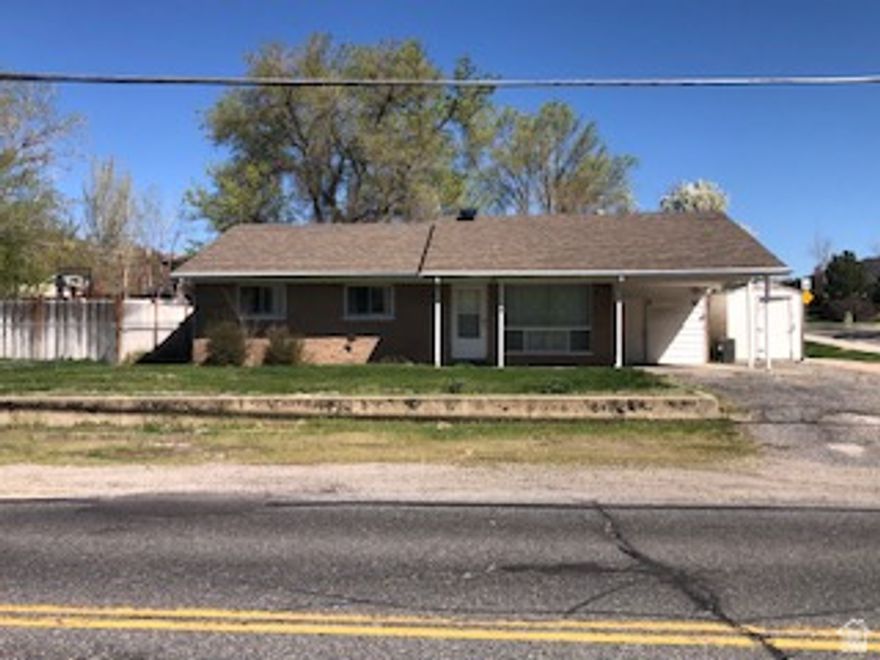 Nice location with lots of natural light.  View of mountains.  Large front room, large family room,. 4 bedrooms and 2 baths.  Detached 2 car garage is deep with lots of space.    Square footage figures are provided as a courtesy estimate only . Buyer is advised to obtain an independent measurement.