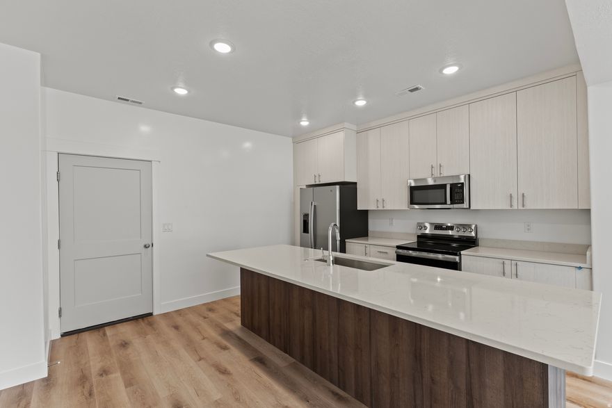 This beautifully designed 3 bed, 2.5 bath townhome is part of a new construction community located near parks, schools, and all the charm Ogden has to offer. These homes feature spacious open layouts, stylish finishes, 2-car garages. Come tour a finished unit to see the quality craftsmanship and secure your new home before they're gone! Special Incentives Available! Qualified first-time homebuyers may be eligible for a $20,000 New Build Grant covering down payment and closing costs. Photos are of a previously completed townhome by the same builder and are for illustrative purposes only. Finishes, features, and layout may vary.
