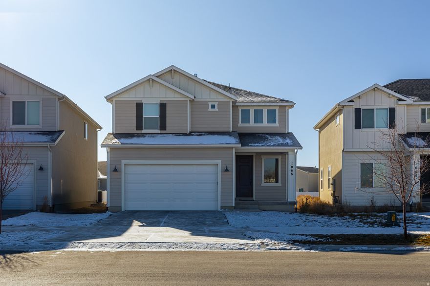 Why pay more to build when this nearly new 2024 home is priced better than what you'd pay to build today? This 4-bedroom, 2.5-bath home in Eagle Mountain offers a modern, open layout with spacious living areas and a functional design ideal for everyday living. Lightly lived in and move-in ready, it delivers the feel of new construction while providing exceptional value and convenience.